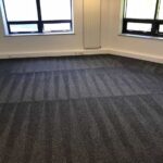 This is a grey commercial carpet that has just been steam cleaned by K&S Carpet Cleaning